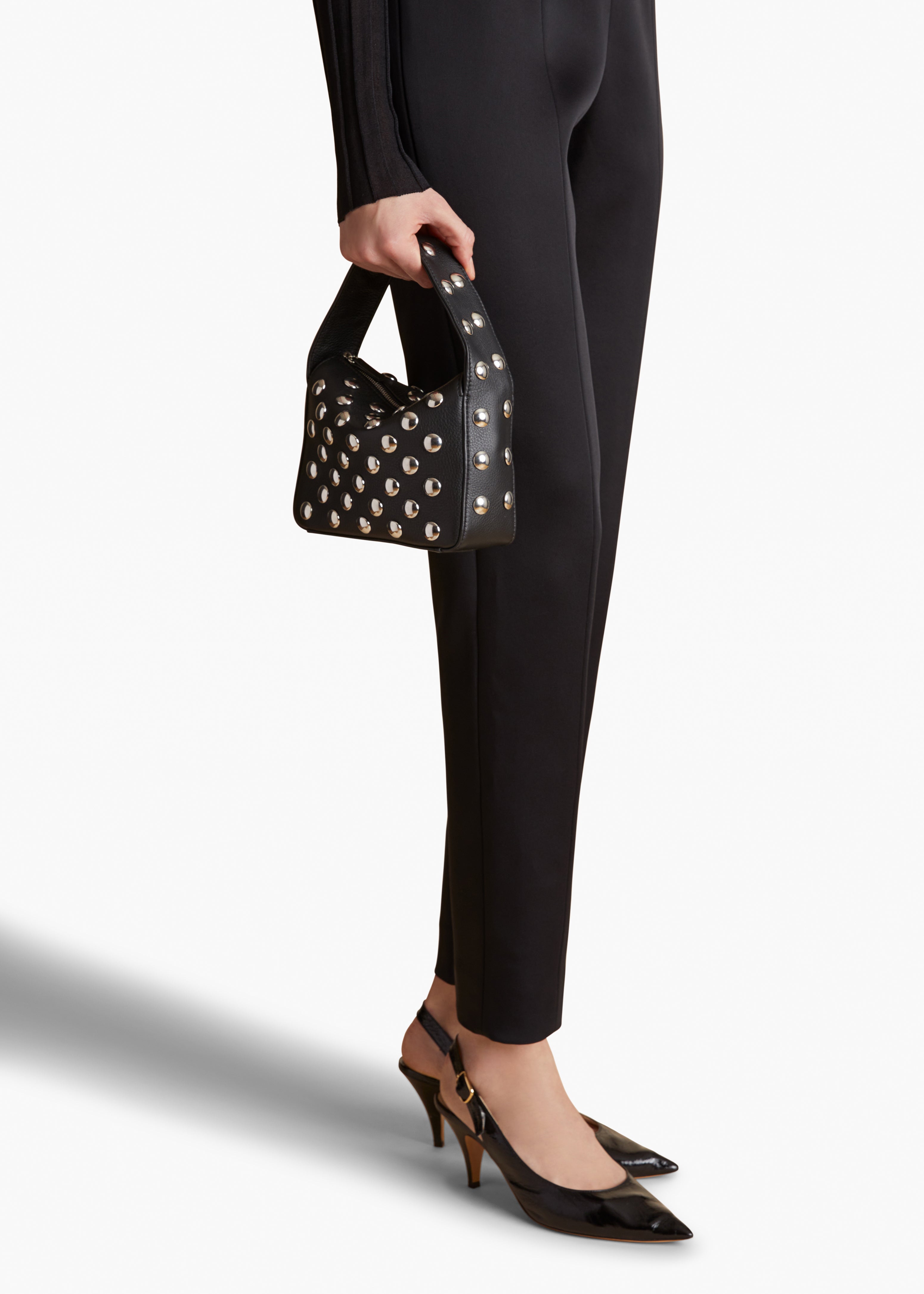 SMALL ELENA HANDBAG IN BLACK PEBBLED LEATHER WITH STUDS STYLED VIEW