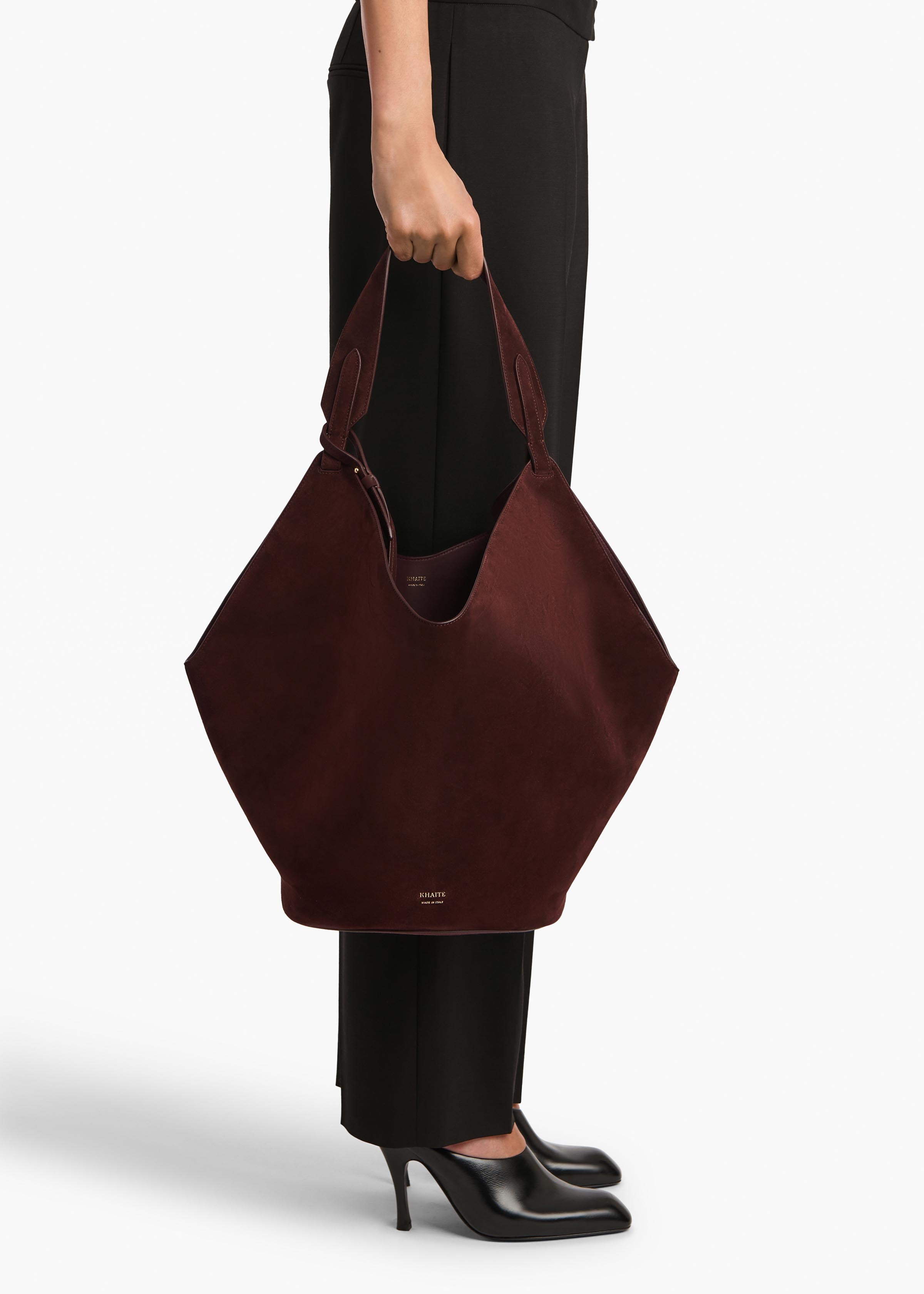 Medium Lotus Tote in Rouge Noir Suede ON FIGURE