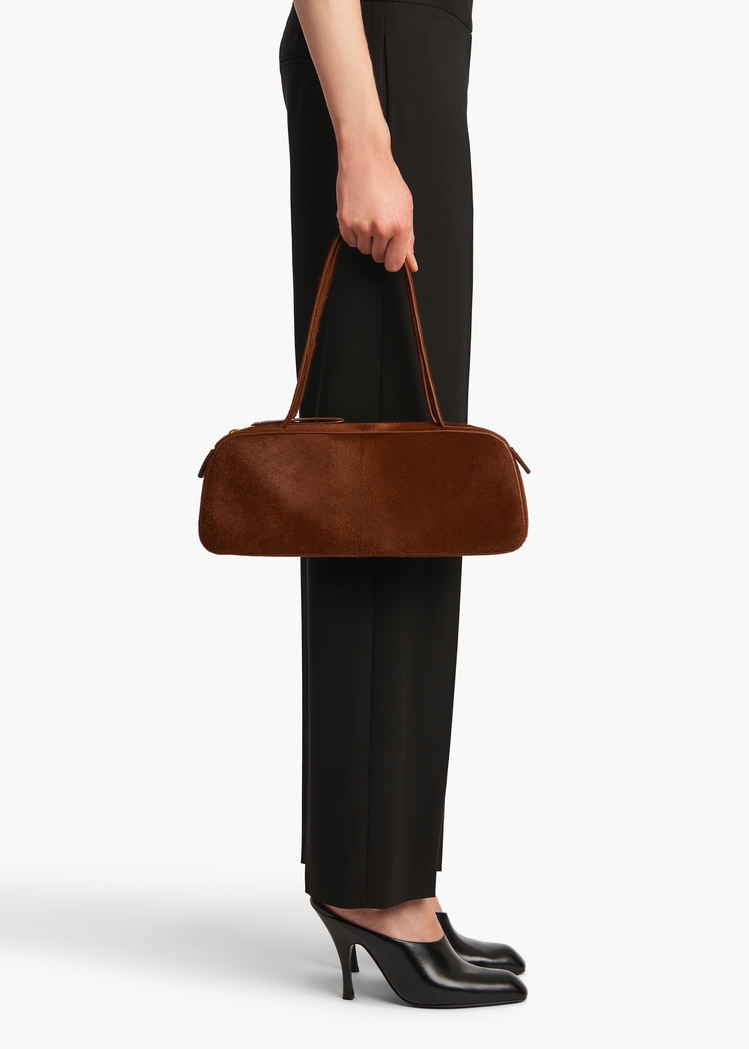 Simona Shoulder Bag in Rust Haircalf ON FIGURE