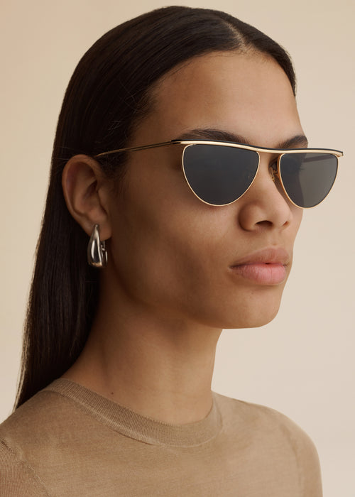The KHAITE x Oliver Peoples 1984C in Gold and Grey
