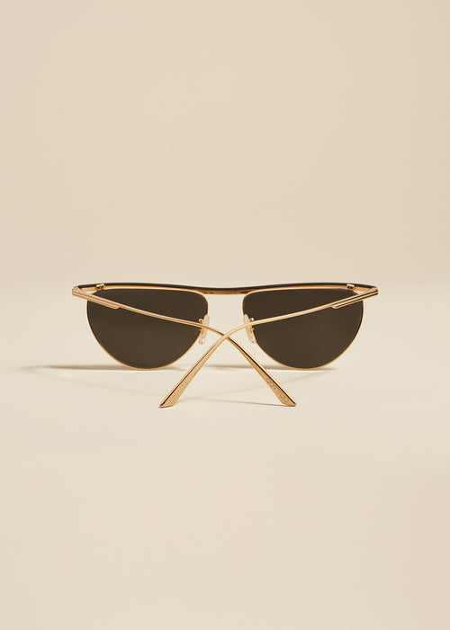 The KHAITE x Oliver Peoples 1984C in Gold and Grey