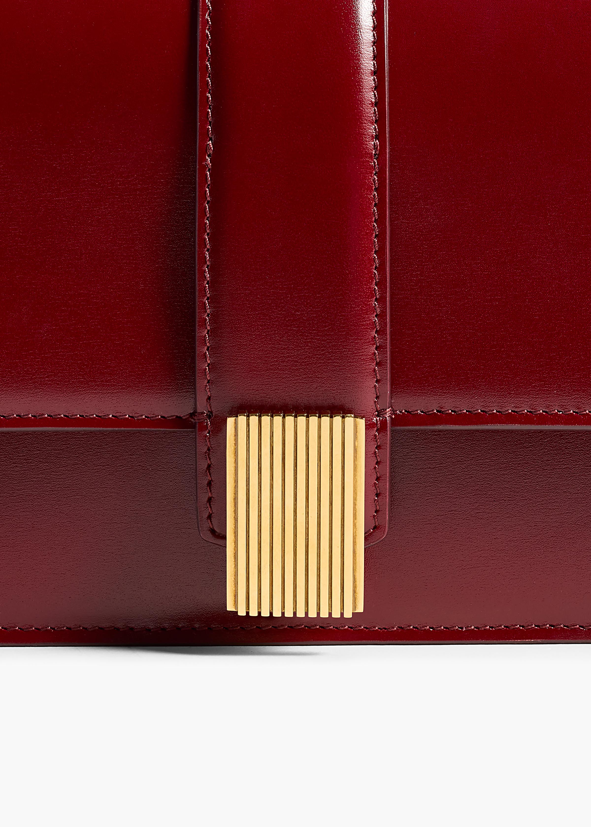 KHAITE  - Blake Long Clutch in Oxblood