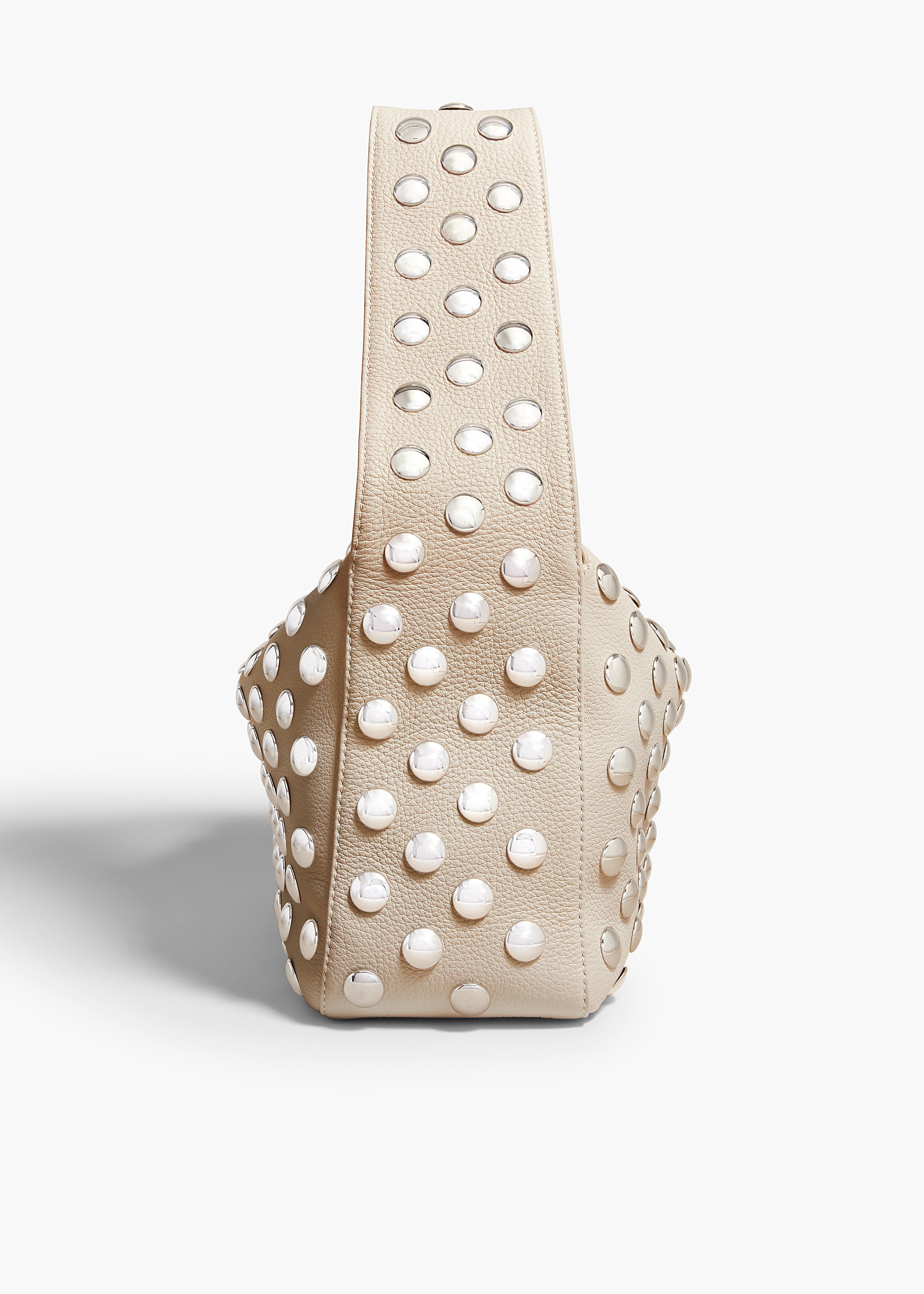 ELENA HANDBAG IN PEBBLED DARK IVORY LEATHER WITH STUDS SIDE VIEW