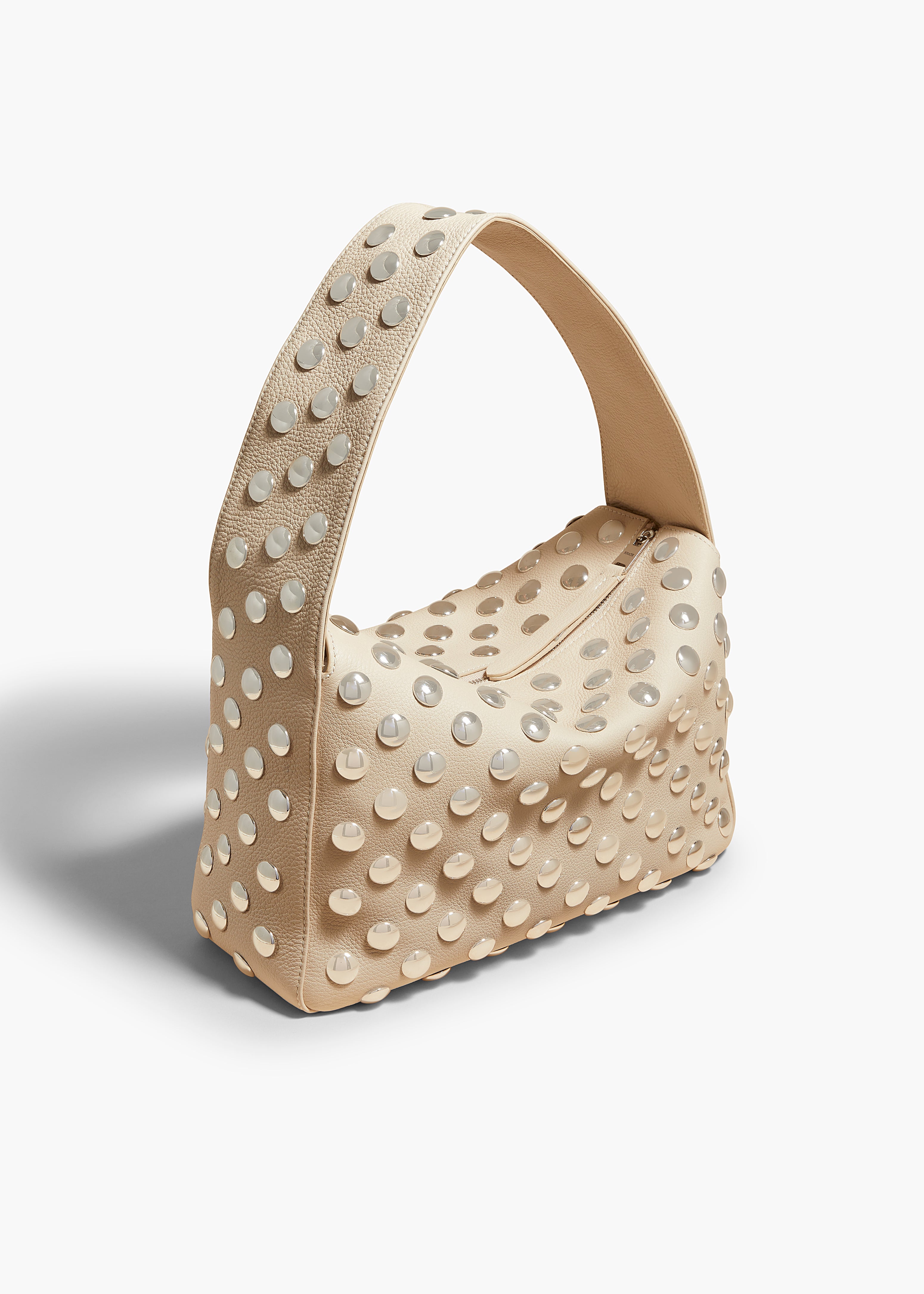 ELENA HANDBAG IN PEBBLED DARK IVORY LEATHER WITH STUDS ANGLED VIEW