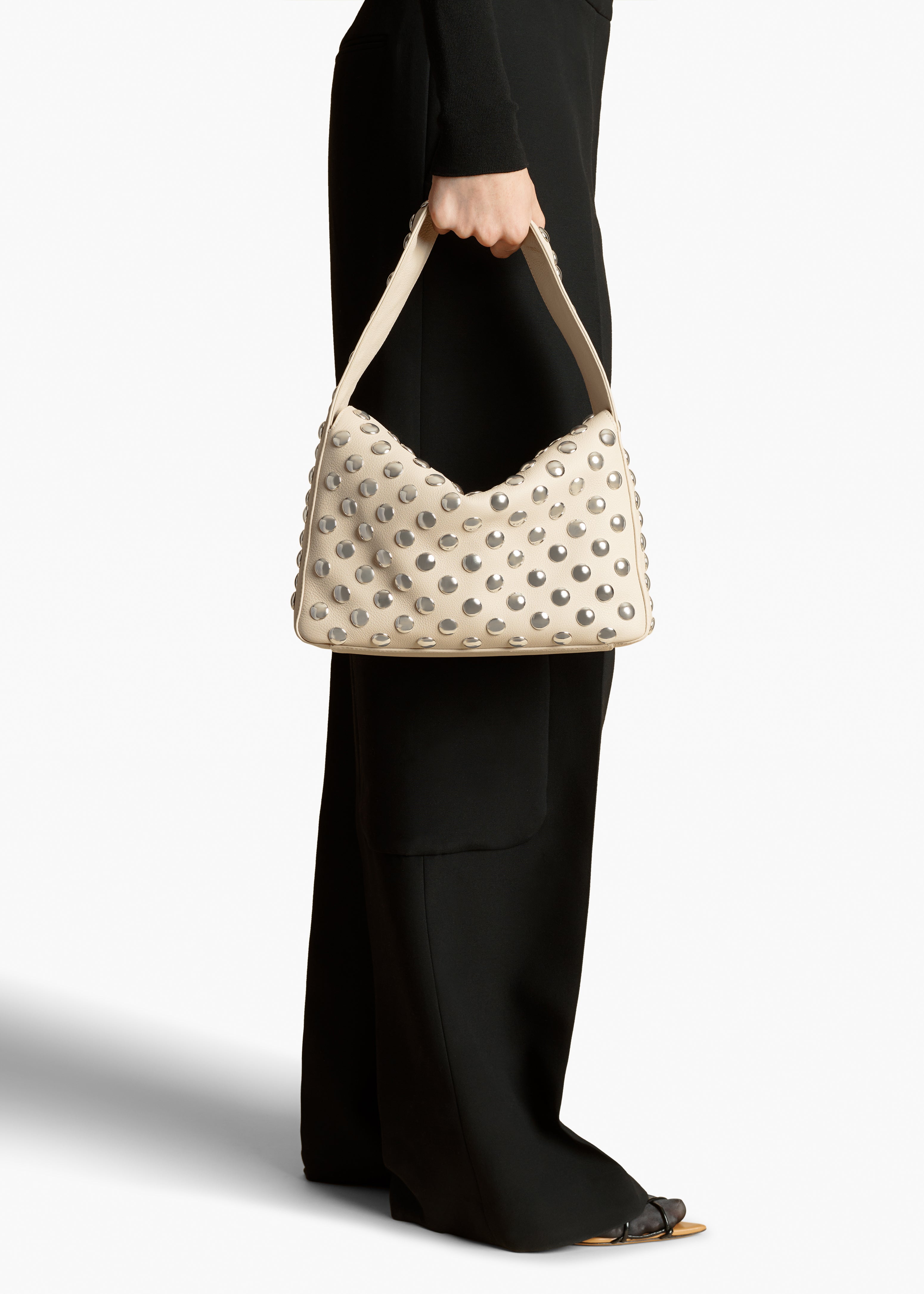 ELENA HANDBAG IN PEBBLED DARK IVORY LEATHER WITH STUDS STYLED VIEW