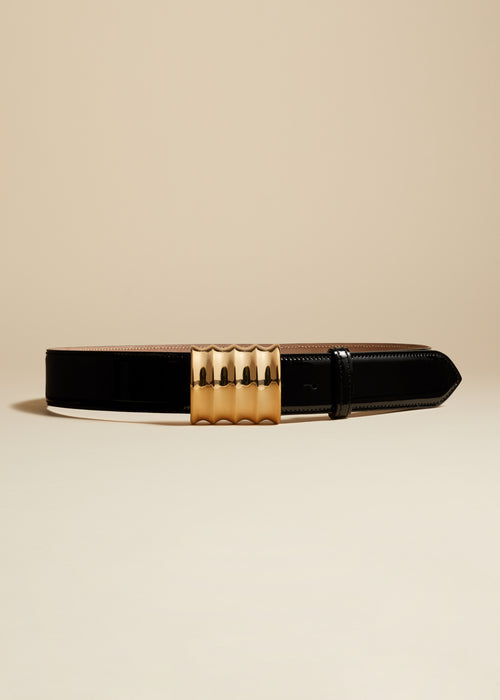The Medium Julius Belt in Black Patent Leather with Gold