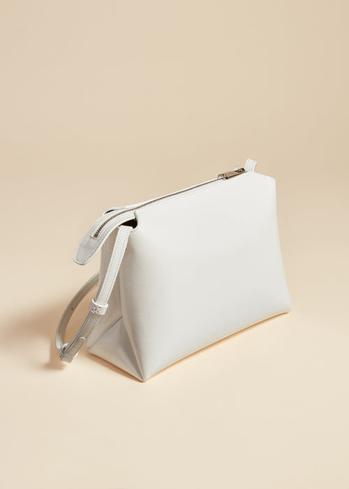 The Lina Crossbody Bag in Optic White Crackle Patent Leather