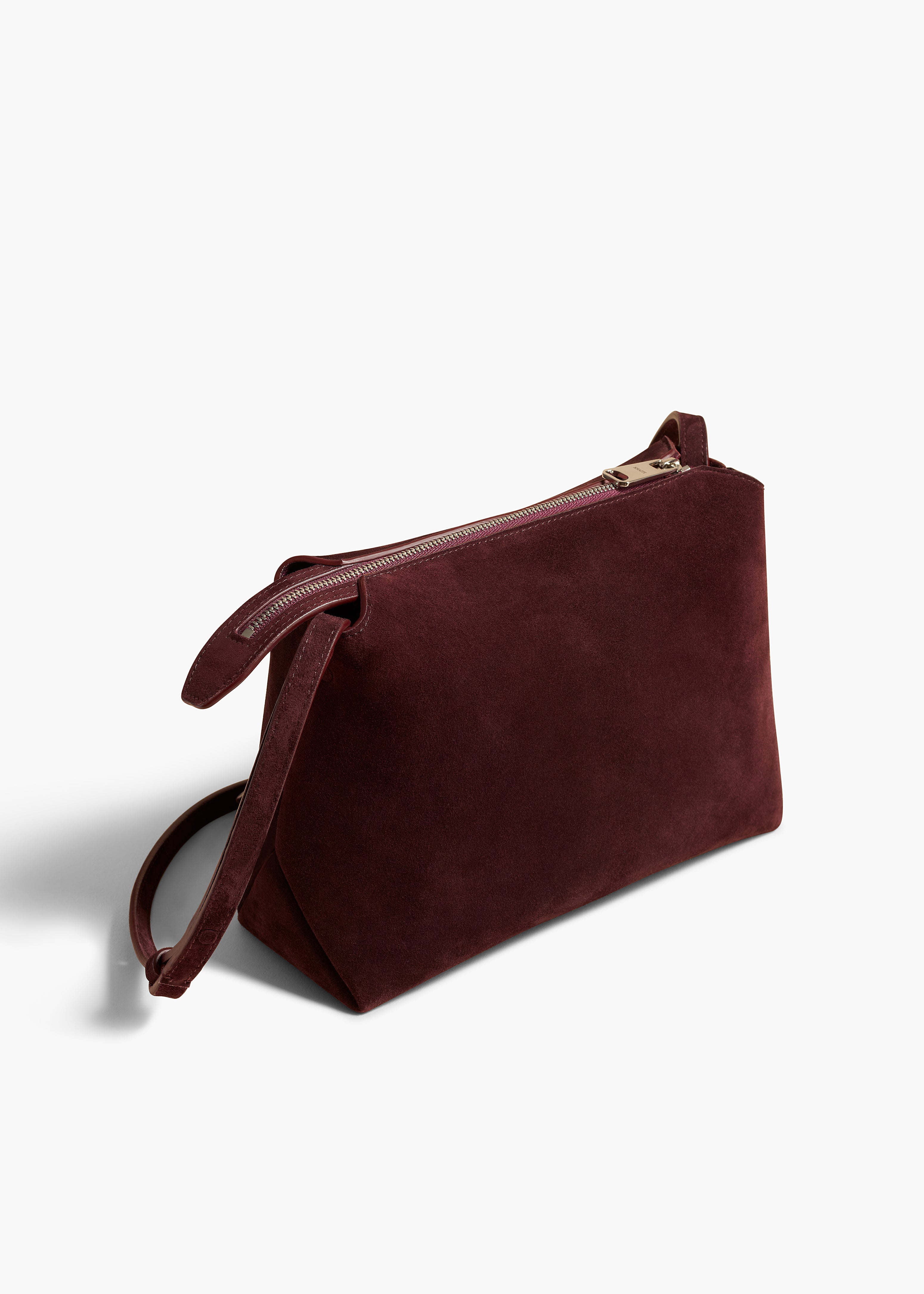 LINA MEDIUM CROSSBODY IN ROUGE NOIR SUEDE ANGLED VIEW