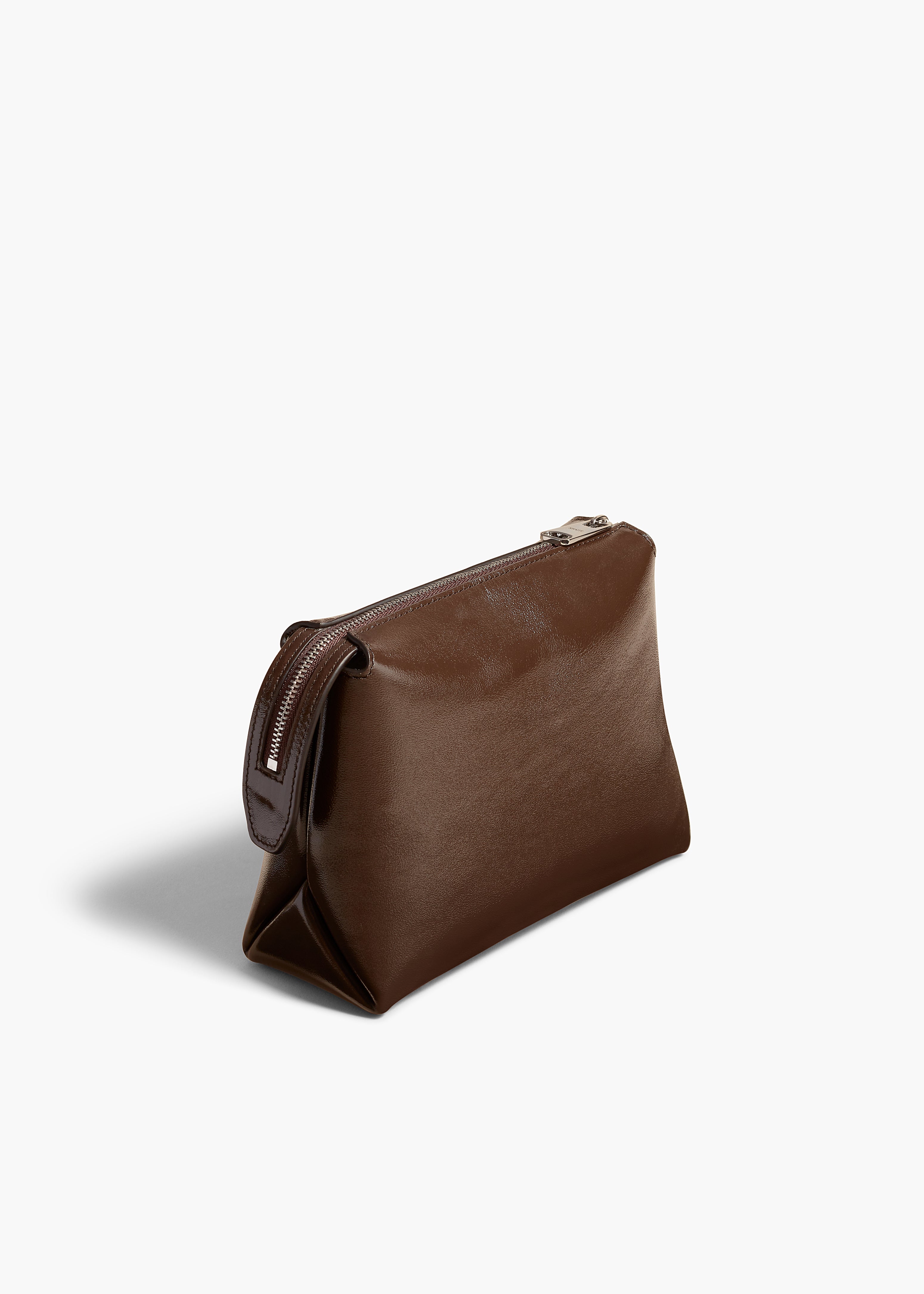 LINA SMALL POUCHETTE IN CHESTNUT CRACKLE PATENT LEATHER ANGLED VIEW