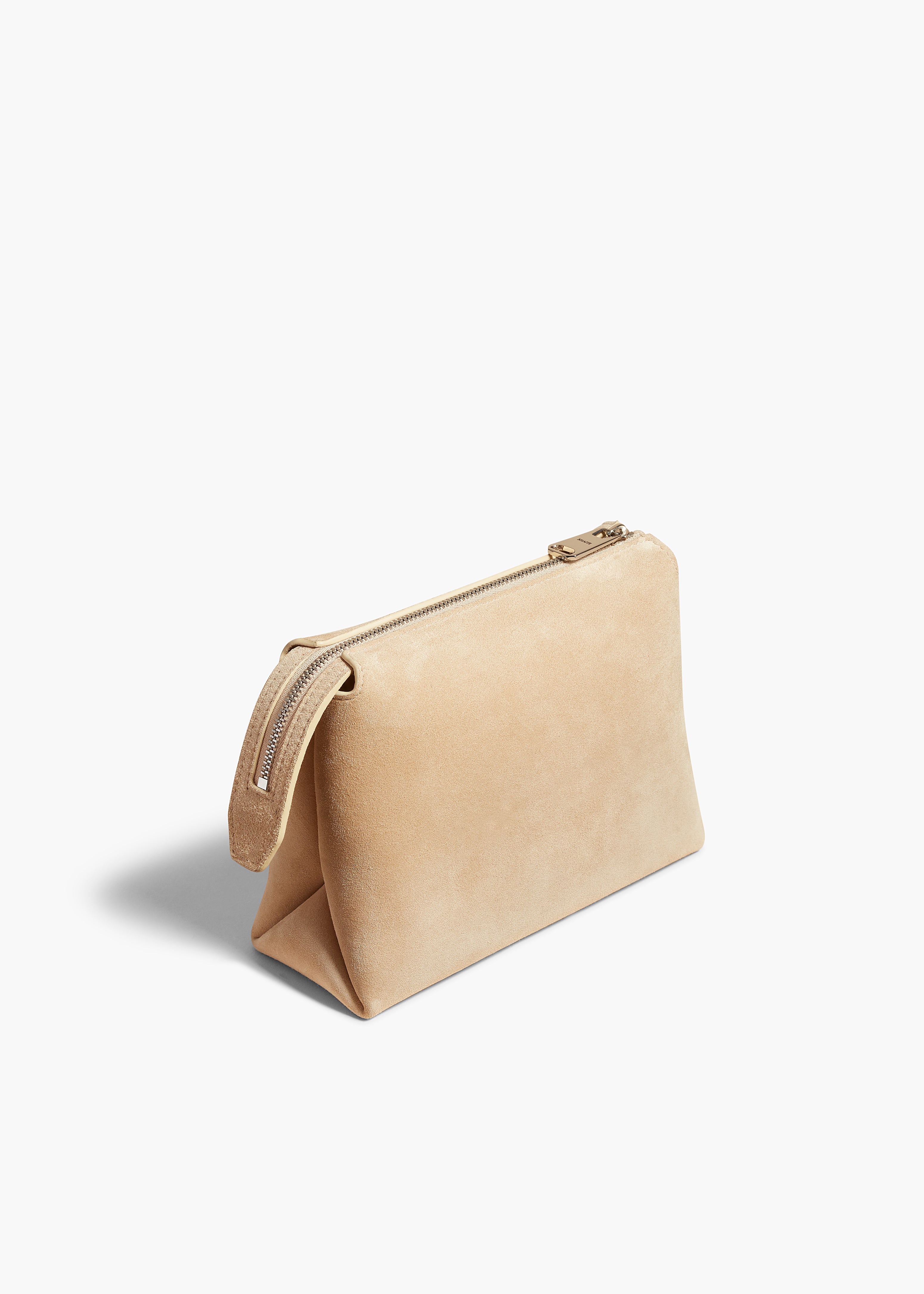 LINA SMALL POUCHETTE IN DARK IVORY SUEDE ANGLED VIEW