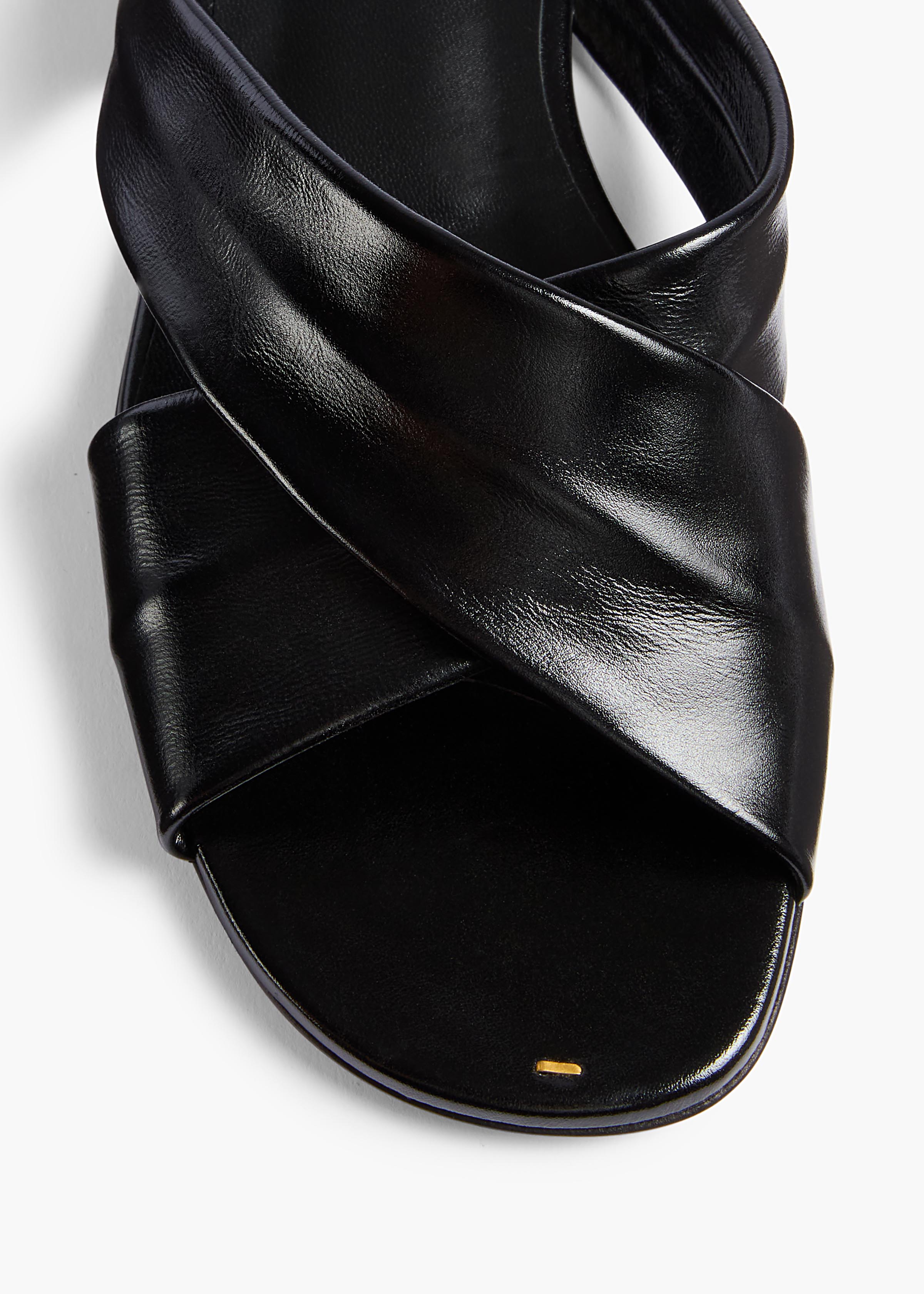 Liria Flat Sandal in Black Glazed Leather – KHAITE