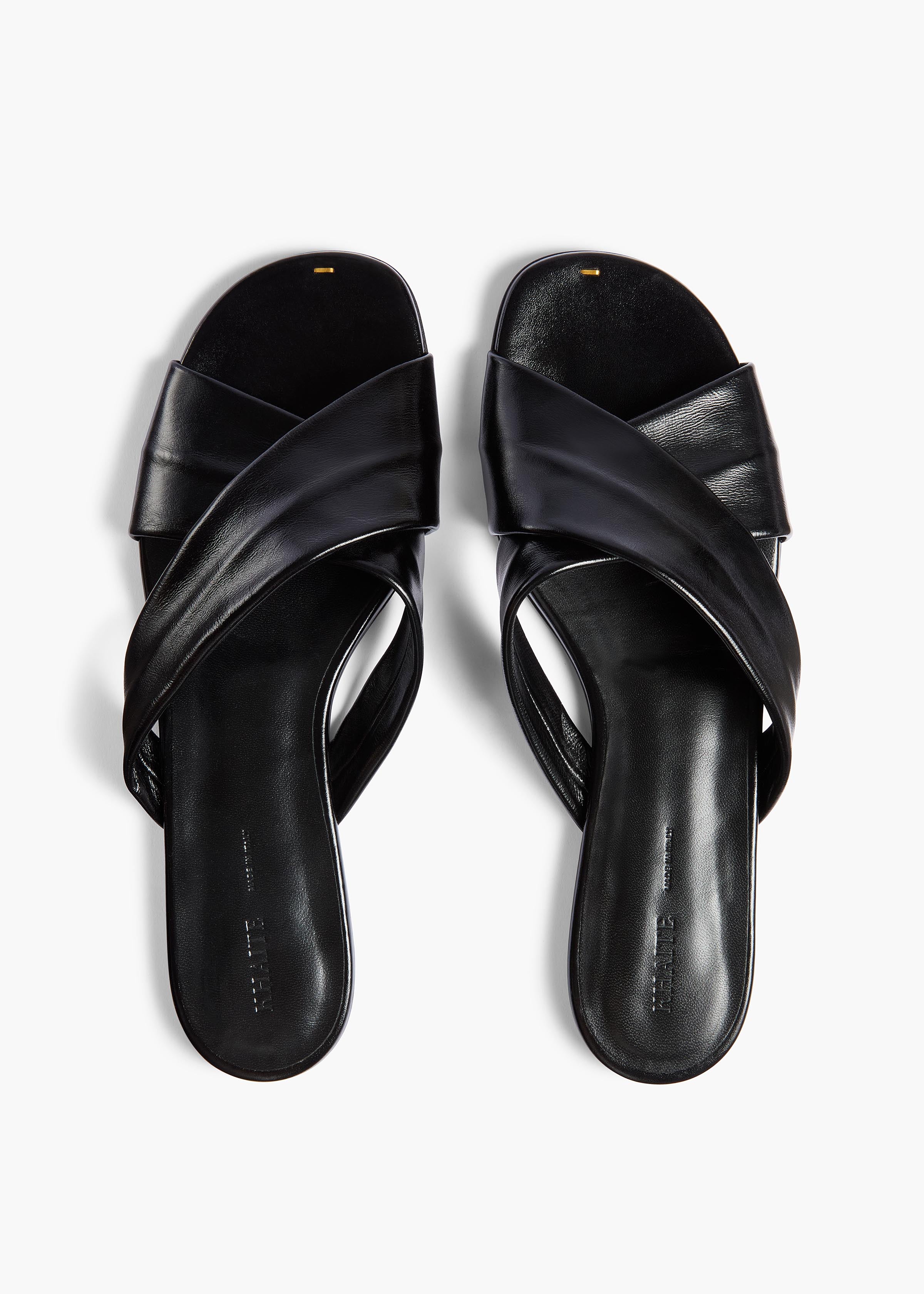 Liria Flat Sandal in Black Glazed Leather – KHAITE