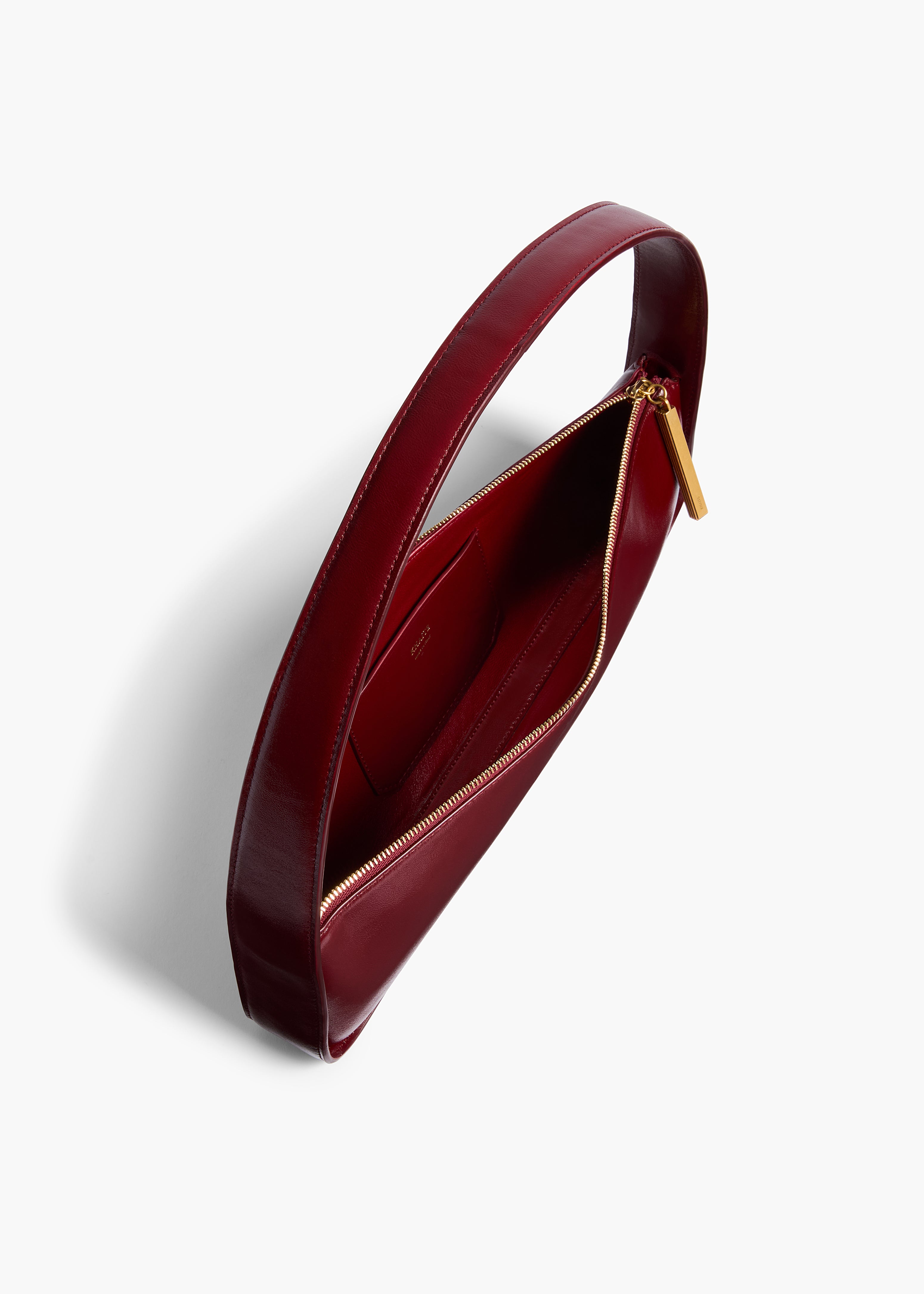 Lori Baguette Bag in Bordeaux Crackle Patent Leather – KHAITE Lori Baguette Bag in Bordeaux Crackle Patent Leather – KHAITE