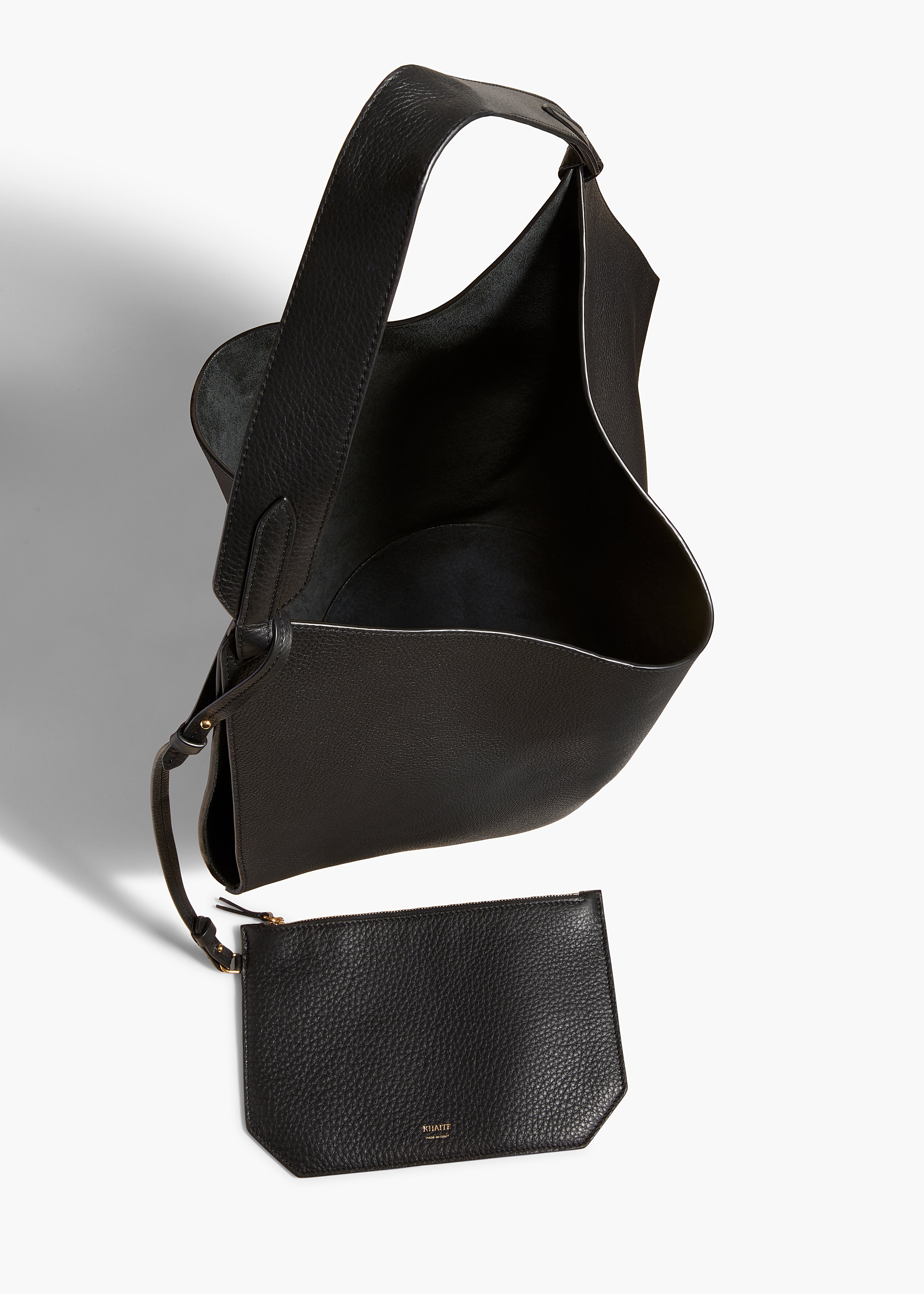 MEDIUM LOTUS HANDBAG IN PEBBLED BLACK LEATHER OVERHEAD VIEW