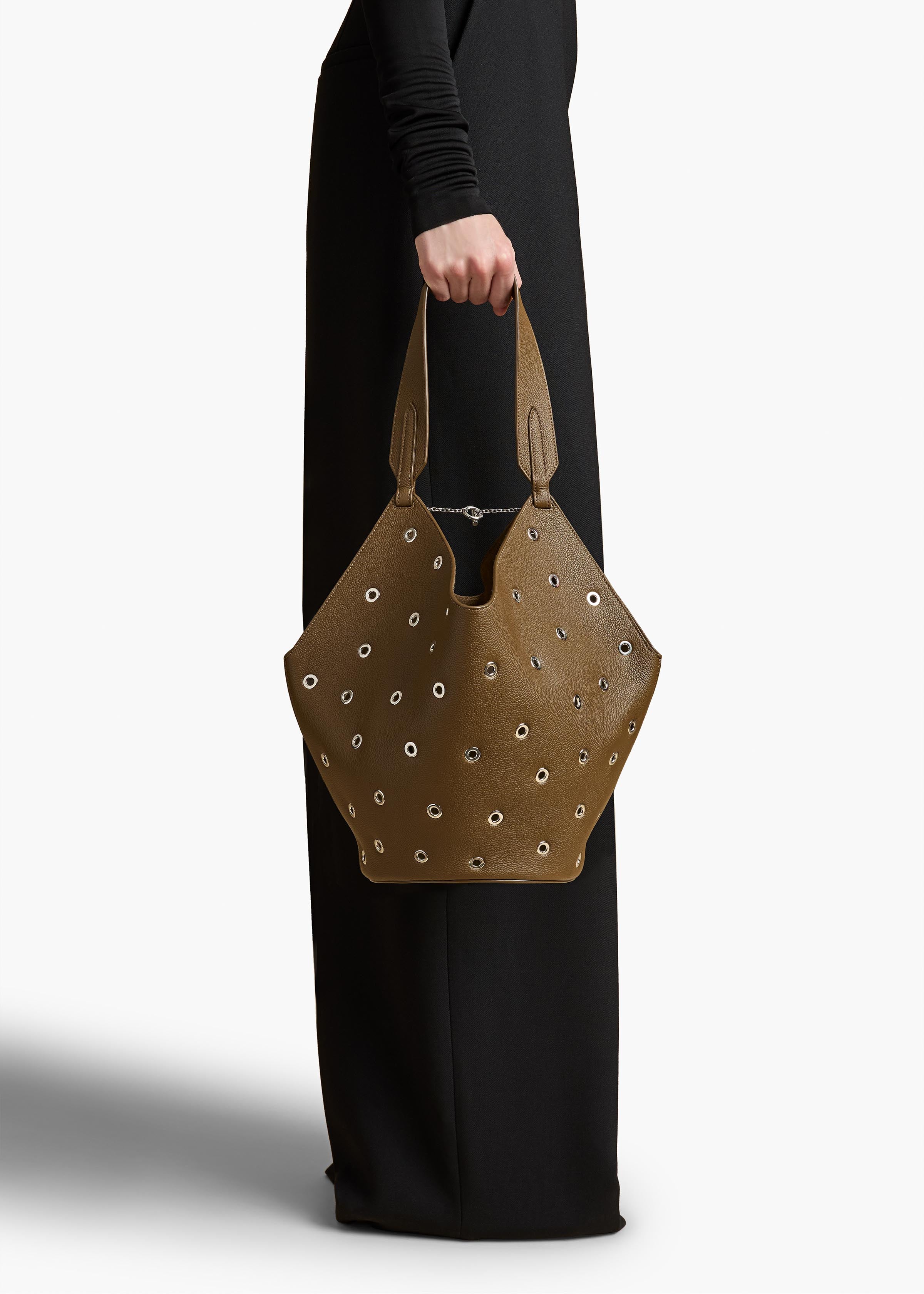 Small Lotus Tote in Dark Olive Pebbled Leather with Grommets ON FIGURE