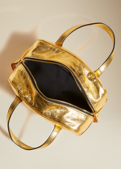 The Small Maeve Crossbody Bag in Gold Metallic Leather
