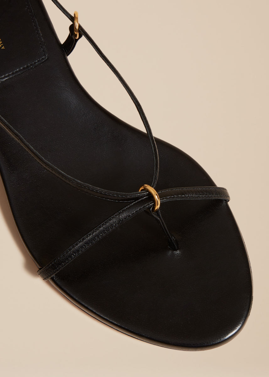 The Marion Strappy Flat Sandal in Black Leather– KHAITE