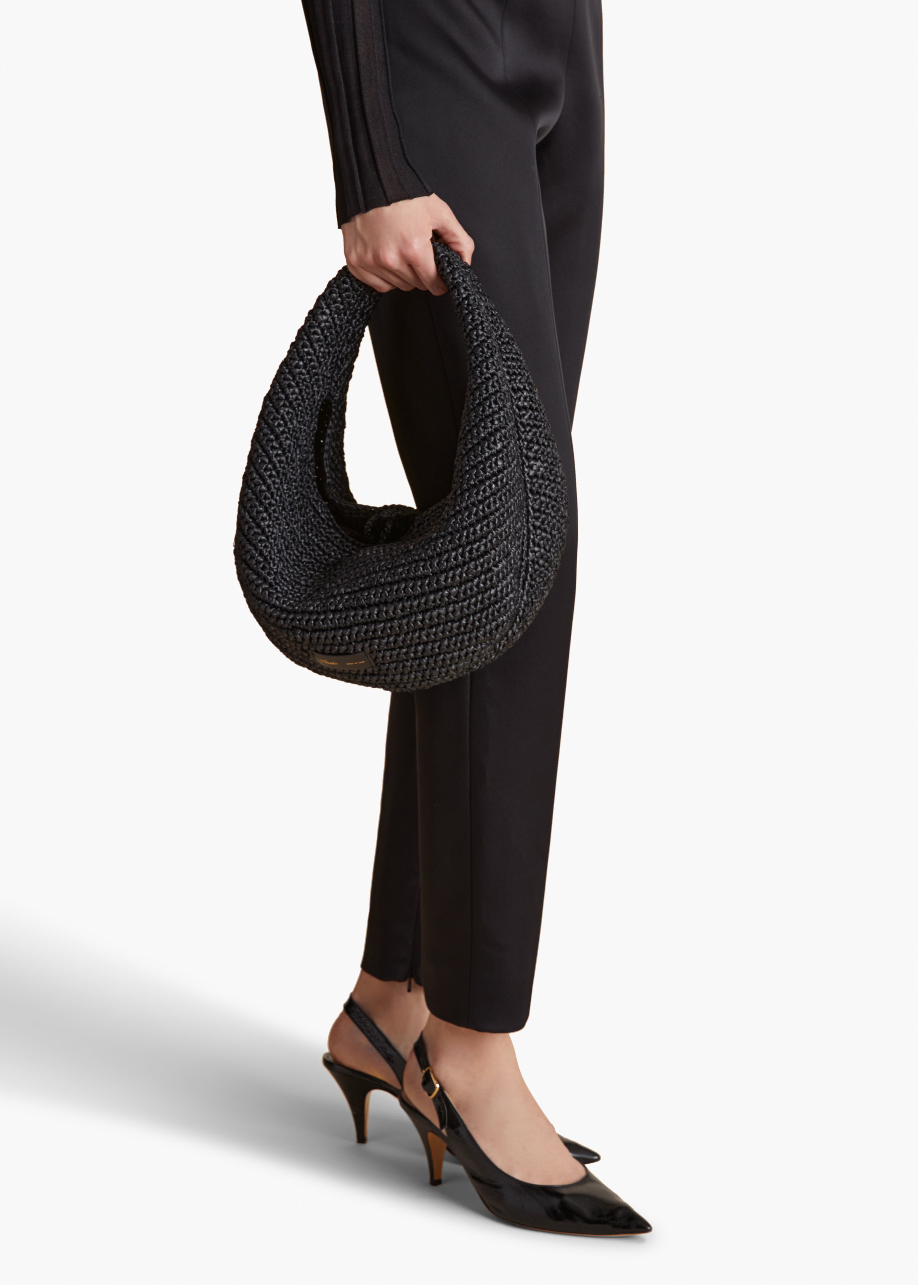 MEDIUM OLIVIA HOBO IN BLACK RAFFIA STYLED VIEW