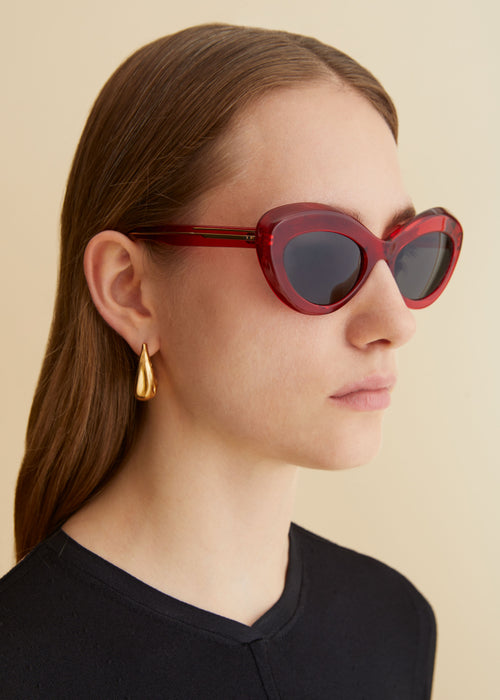 The KHAITE x Oliver Peoples 1968C in Translucent Red and Grey