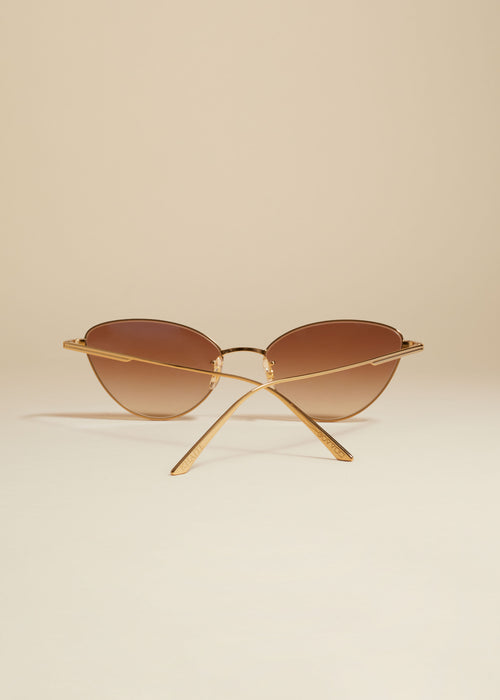 The KHAITE x Oliver Peoples 1998C in Gold and Dark Brown