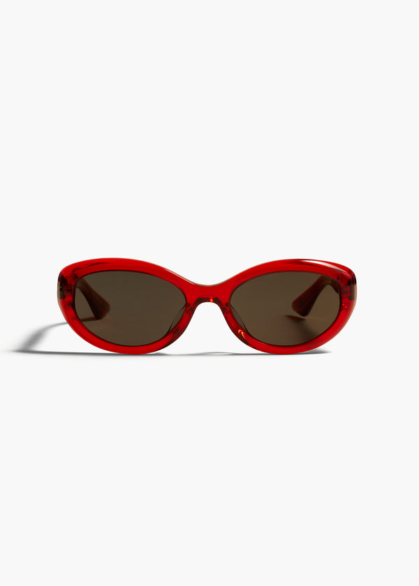 KHAITE X OLIVER PEOPLES 1969C IN TRANSLUCENT RED FRONT VIEW