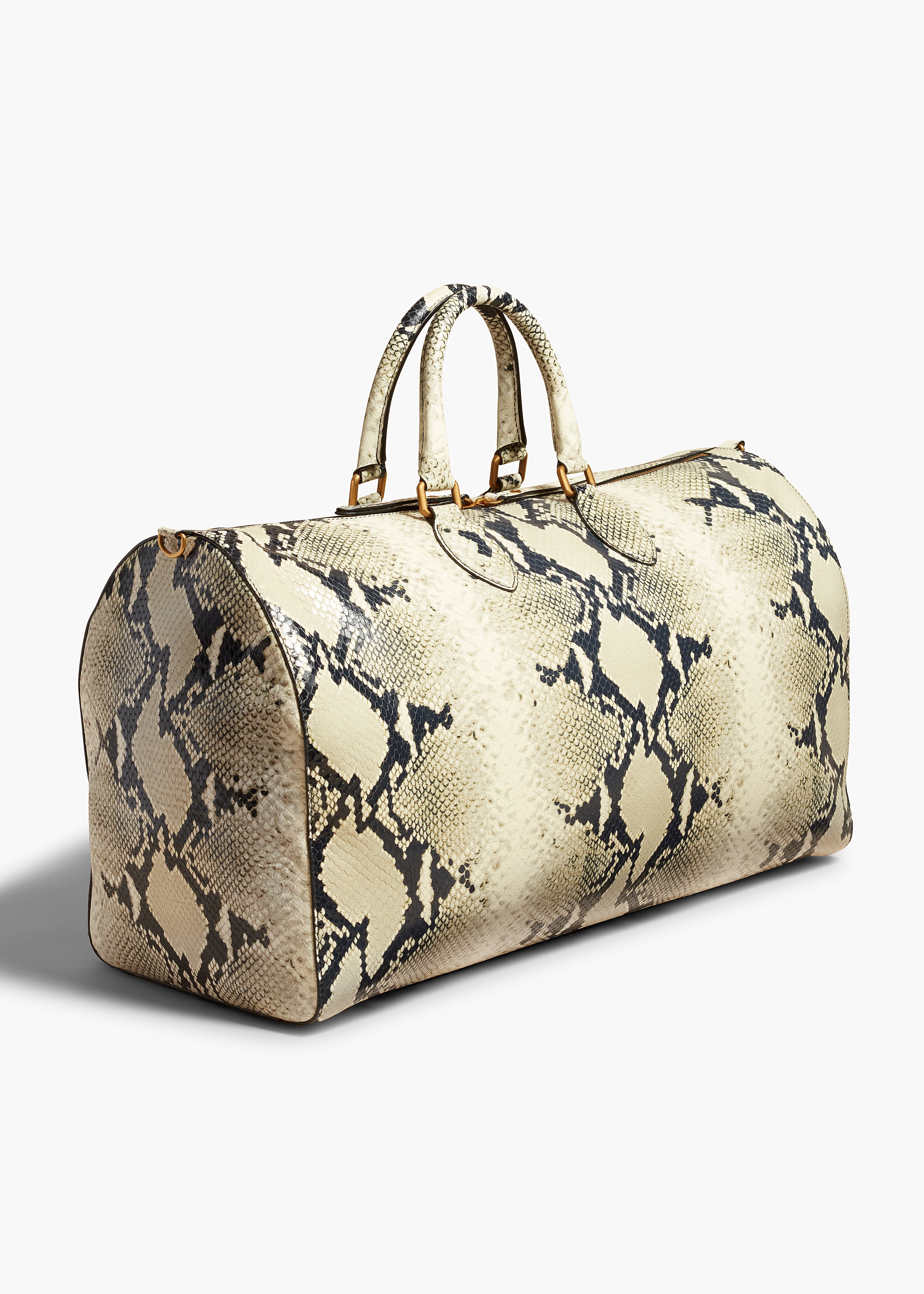 PIERRE HANDBAG IN NATURAL PYTHON ANGLED VIEW