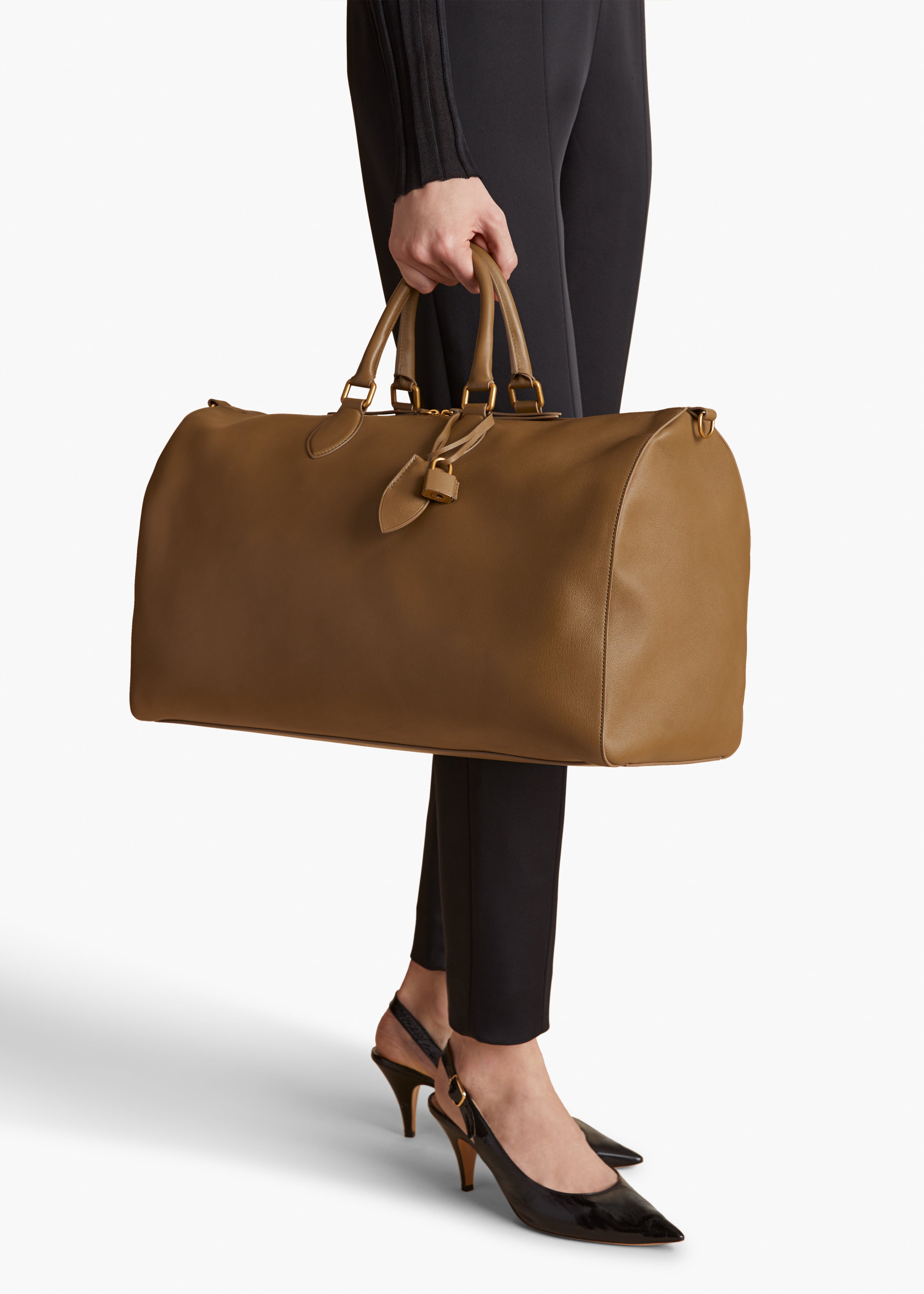 PIERRE WEEKENDER BAG IN TOFFEE PEBBLED LEATHER ON FIGURE