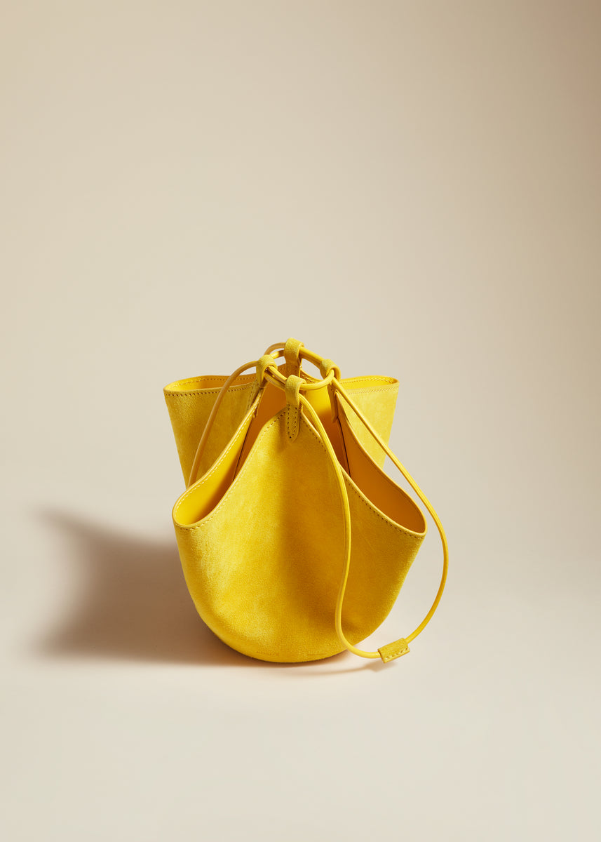 The Mini Lotus Drawstring Bag in Lemon Suede– KHAITE