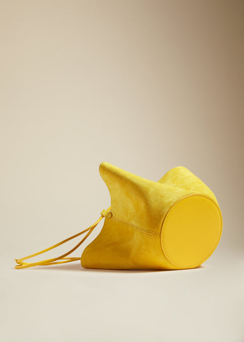 The Mini Lotus Drawstring Bag in Lemon Suede